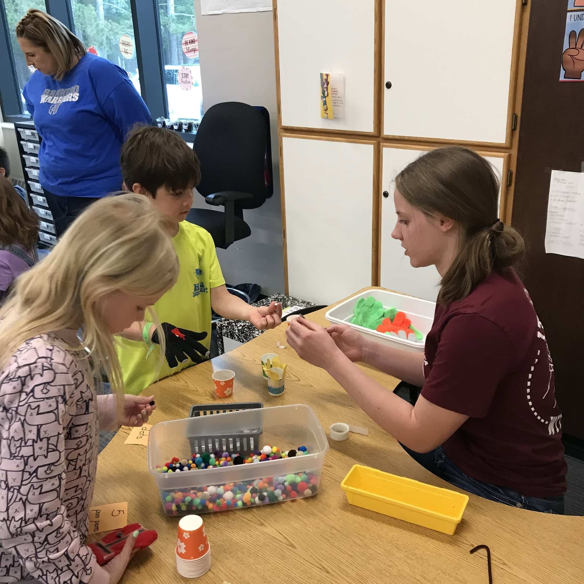 ellie with students
