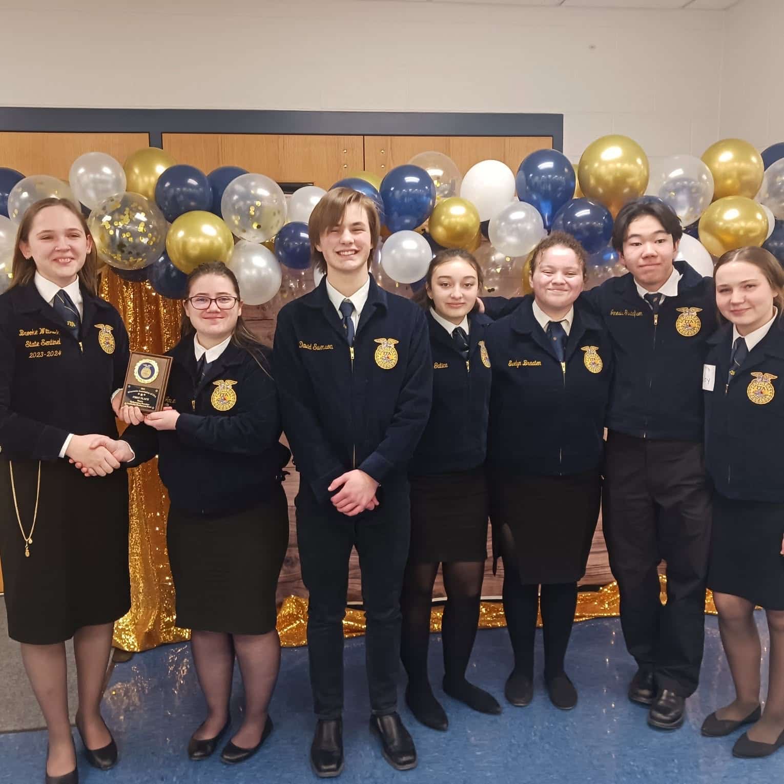 sarah jensen award with team